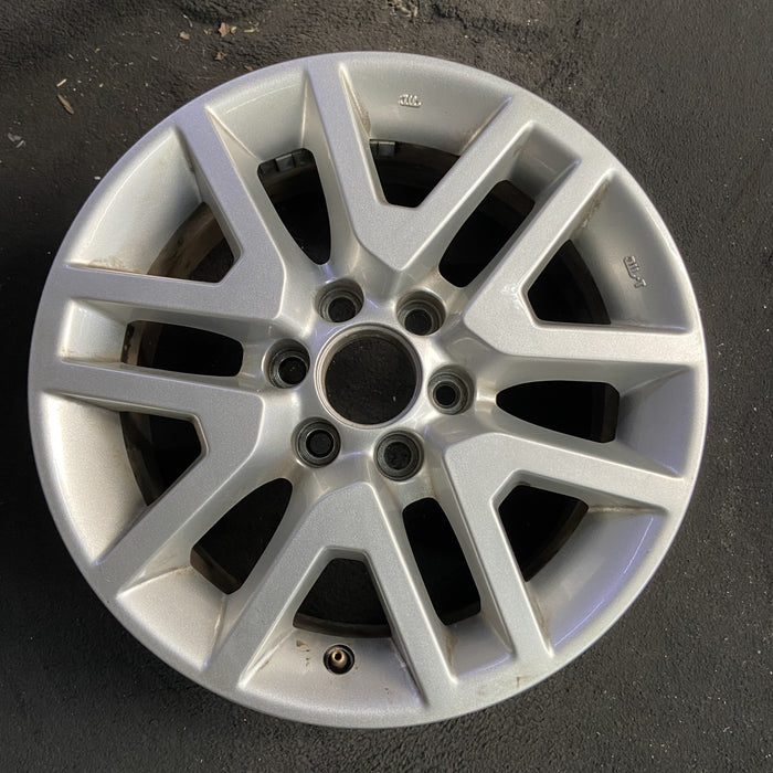 16" FRONTIER 14-21 16x7, alloy , open V spoke Original OEM Wheel Rim - Angle View