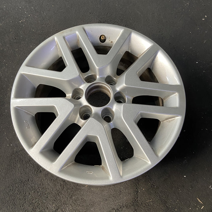 16" FRONTIER 14-21 16x7, alloy , open V spoke Original OEM Wheel Rim - Close-Up Detail