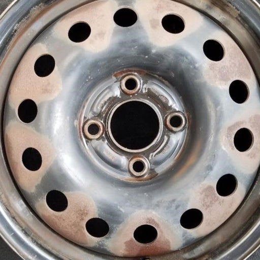 15" FIESTA 11-13 15x6, steel, 14 hole Original OEM Wheel Rim - Angle View