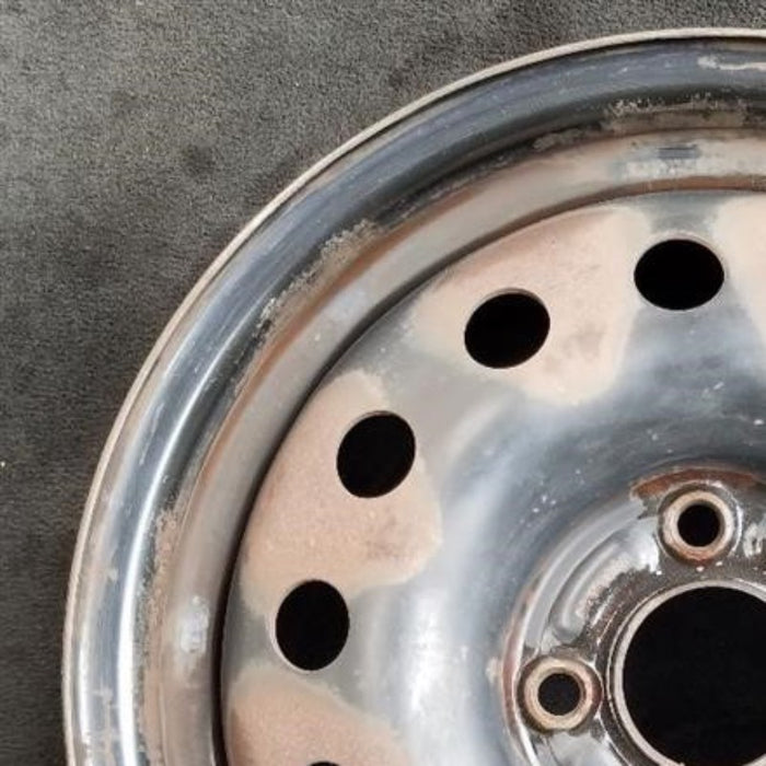 15" FIESTA 11-13 15x6, steel, 14 hole Original OEM Wheel Rim - Side Profile
