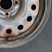 15" FIESTA 11-13 15x6, steel, 14 hole Original OEM Wheel Rim - Back View