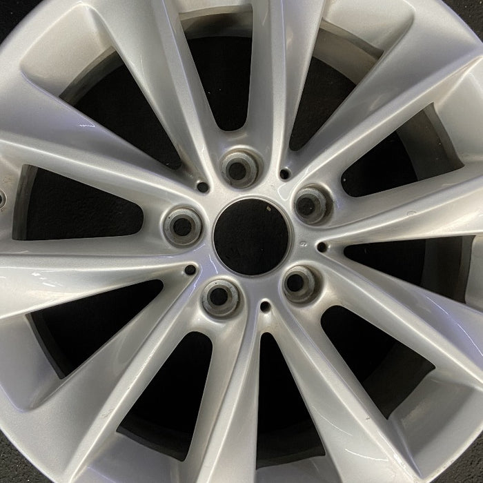 18" BMW X3 11-14 18x8 alloy 5 spoke V spoke design silver Original OEM Wheel Rim - Angle View