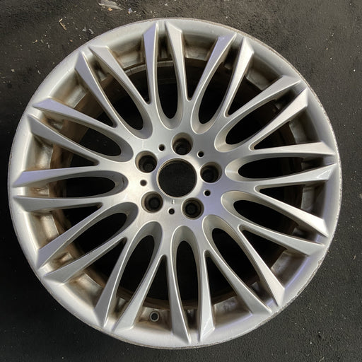20" BMW 745i 02-05 20x9 , 12 spoke Original OEM Wheel Rim - Angle View