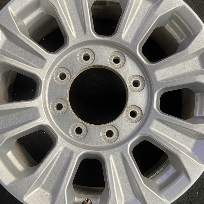 18" FORD F250SD PICKUP 20-22 18x8 aluminum 8 spoke silver Original OEM Wheel Rim - Angle View