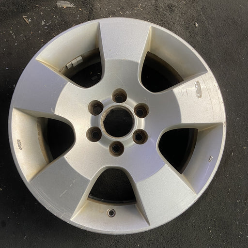 16" PATHFINDER 06-09 16x7, alloy, 5 spoke Original OEM Wheel Rim - Angle View