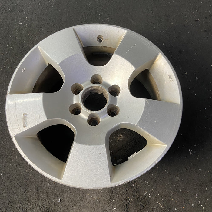 16" PATHFINDER 06-09 16x7, alloy, 5 spoke Original OEM Wheel Rim - Close-Up Detail