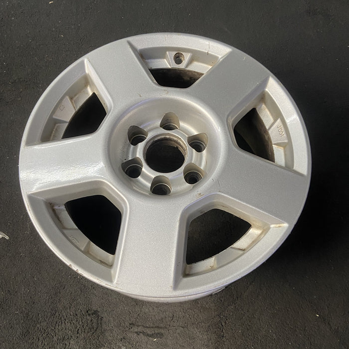 16" FRONTIER 05-08 16x7, alloy, 5 spoke Original OEM Wheel Rim - Close-Up Detail