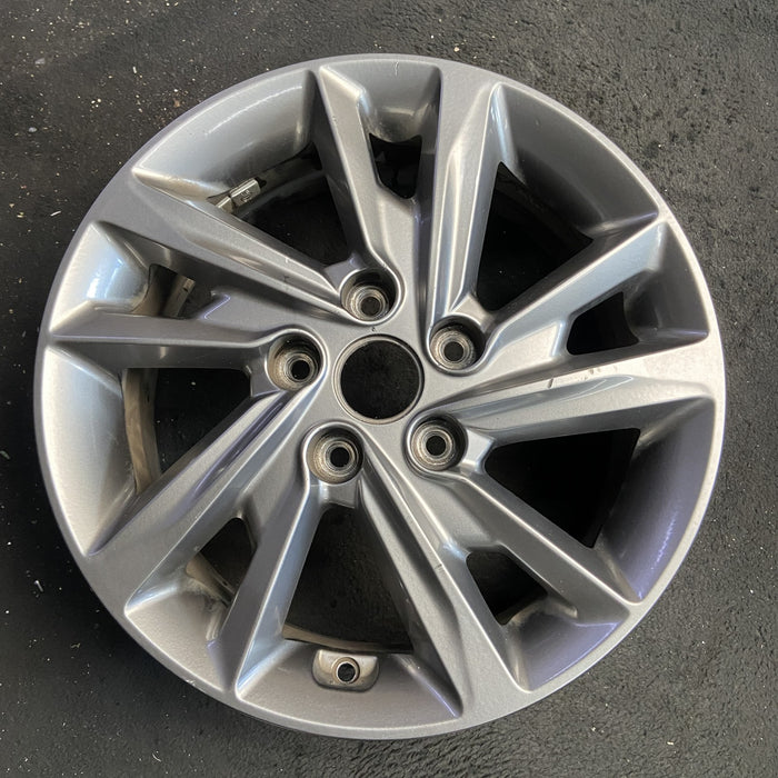 16" OPTIMA 19 16x6.5 , 10 spoke Original OEM Wheel Rim - Angle View