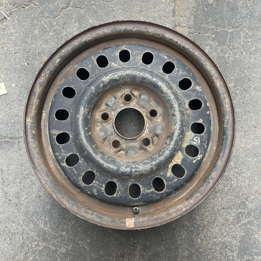 15" SABLE 96-99 15x6, steel Original OEM Wheel Rim - Angle View