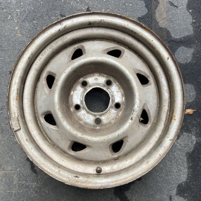 15" BLAZER S10/JIMMY S15 95-97 4x2, 15x7, steel Original OEM Wheel Rim - Angle View