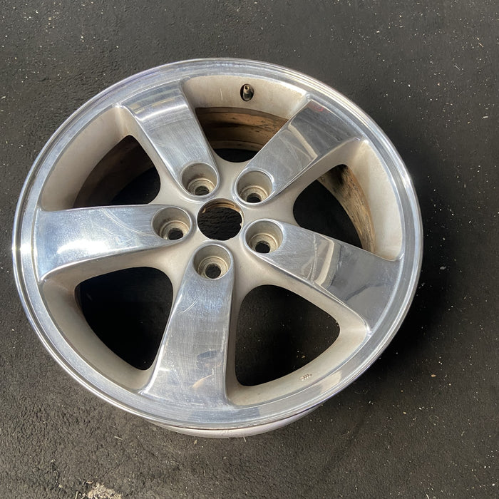 17" STRATUS 03-05 Cpe, 17x6.5 , chrome Original OEM Wheel Rim - Close-Up Detail