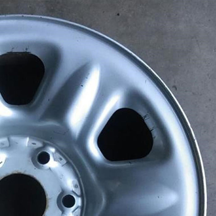 17" TITAN 04-07 17x7.5, steel Original OEM Wheel Rim - Close-Up Detail
