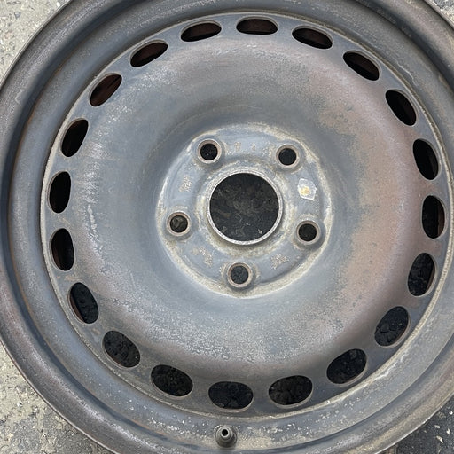 15" PASSAT 01 from VIN 050000, 15x7, steel Original OEM Wheel Rim - Angle View