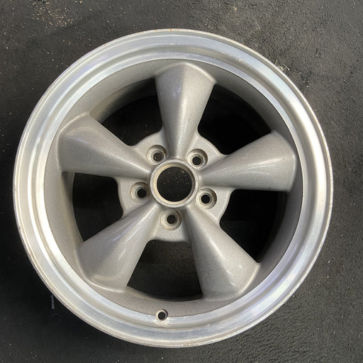 17" MUSTANG 00 17x8, , w/exposed lug nuts, funnel spoke Original OEM Wheel Rim - Angle View