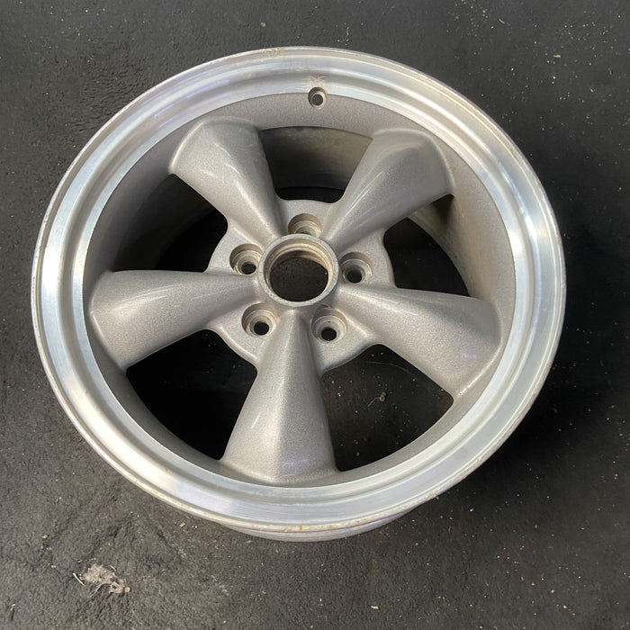 17" MUSTANG 00 17x8, , w/exposed lug nuts, funnel spoke Original OEM Wheel Rim - Close-Up Detail