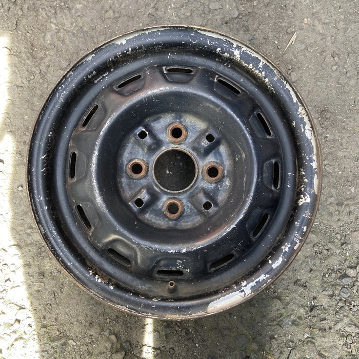 13" COROLLA 86-87 13x5 steel Lftbk 12 hole Original OEM Wheel Rim - Front View