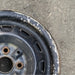 13" COROLLA 86-87 13x5 steel Lftbk 12 hole Original OEM Wheel Rim - Close-Up Detail