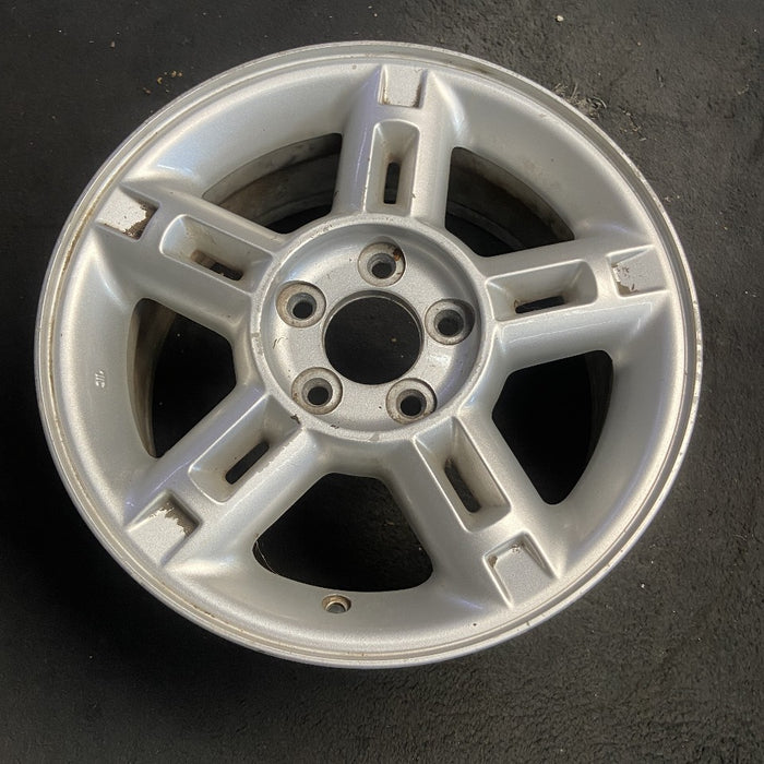 16" EXPLORER 02-03 4 Dr exc. Sport Trac; 16x7 aluminum 5 double spokes w/openings in spokes sparkle silver finish Original OEM Wheel Rim