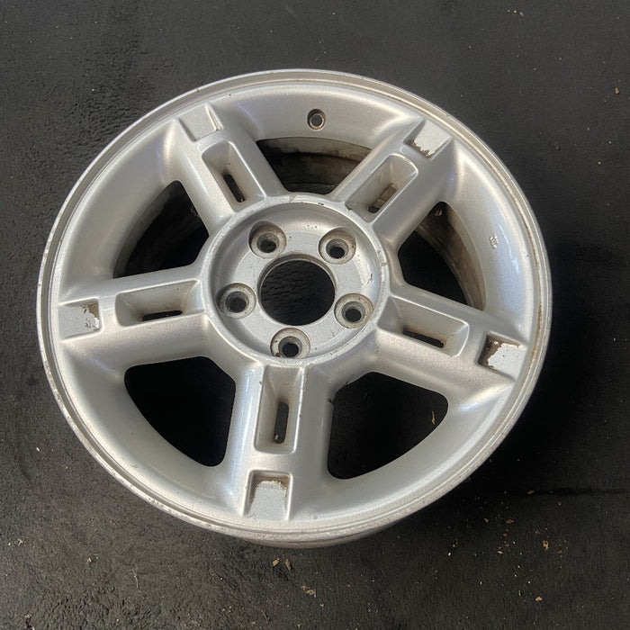 16" EXPLORER 02-03 4 Dr exc. Sport Trac; 16x7 aluminum 5 double spokes w/openings in spokes sparkle silver finish Original OEM Wheel Rim