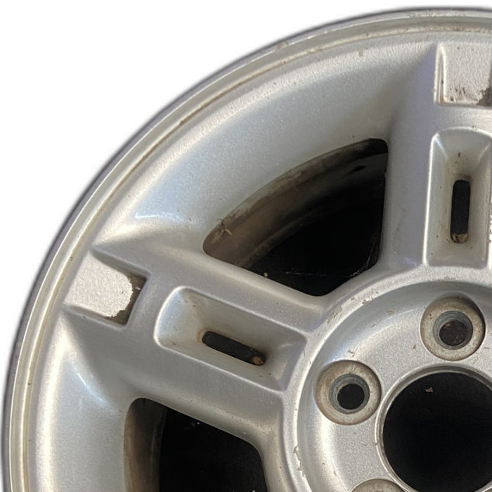 16" EXPLORER 02-03 4 Dr exc. Sport Trac; 16x7 aluminum 5 double spokes w/openings in spokes sparkle silver finish Original OEM Wheel Rim