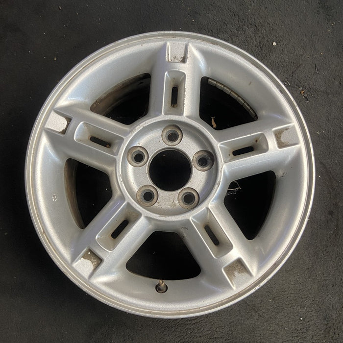 16" EXPLORER 02-03 4 Dr exc. Sport Trac; 16x7 aluminum 5 double spokes w/openings in spokes sparkle silver finish Original OEM Wheel Rim