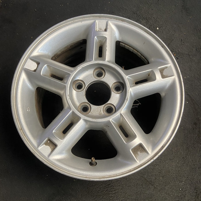 16" EXPLORER 02-03 4 Dr exc. Sport Trac; 16x7 aluminum 5 double spokes w/openings in spokes sparkle silver finish Original OEM Wheel Rim