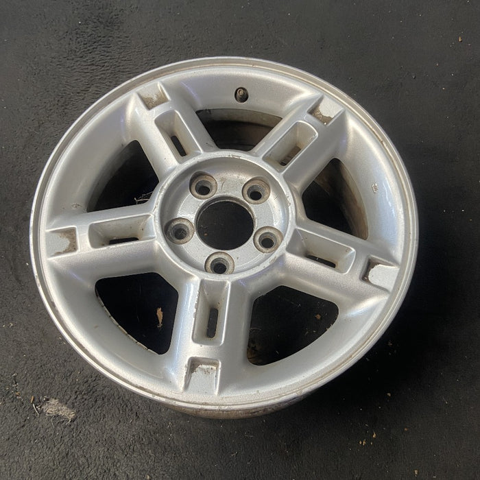 16" EXPLORER 02-03 4 Dr exc. Sport Trac; 16x7 aluminum 5 double spokes w/openings in spokes sparkle silver finish Original OEM Wheel Rim