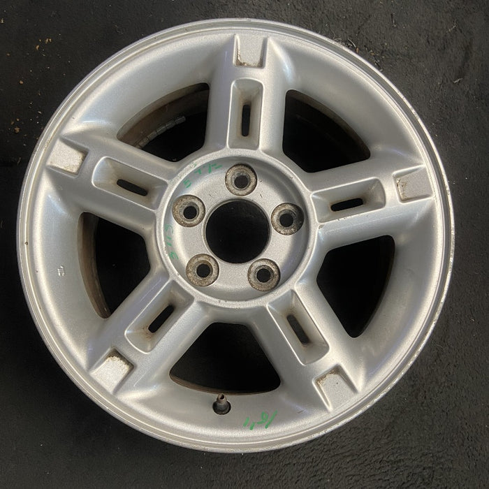 16" EXPLORER 02-03 4 Dr exc. Sport Trac; 16x7 aluminum 5 double spokes w/openings in spokes sparkle silver finish Original OEM Wheel Rim