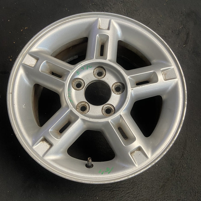 16" EXPLORER 02-03 4 Dr exc. Sport Trac; 16x7 aluminum 5 double spokes w/openings in spokes sparkle silver finish Original OEM Wheel Rim