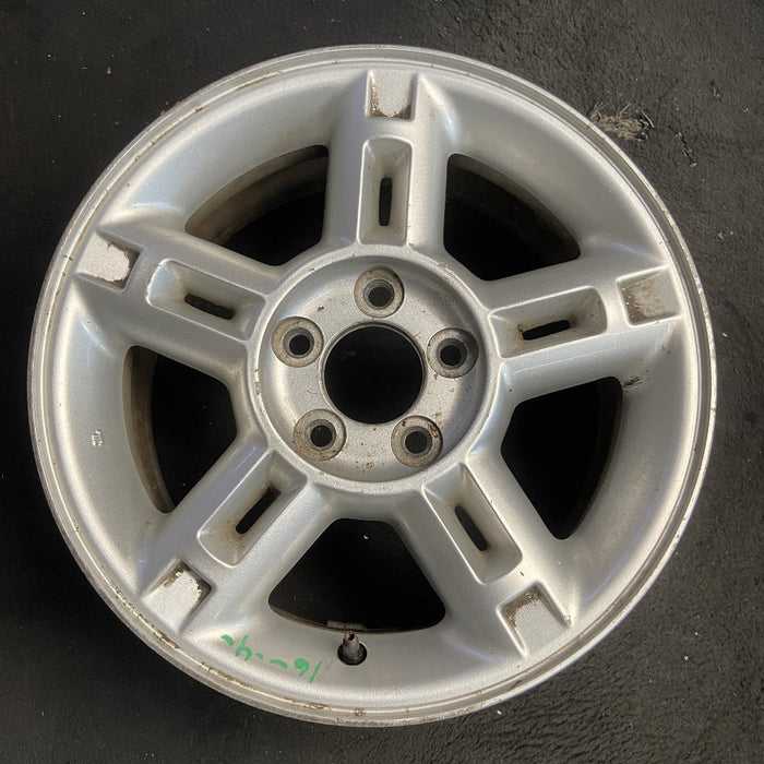 16" EXPLORER 02-03 4 Dr exc. Sport Trac; 16x7 aluminum 5 double spokes w/openings in spokes sparkle silver finish Original OEM Wheel Rim
