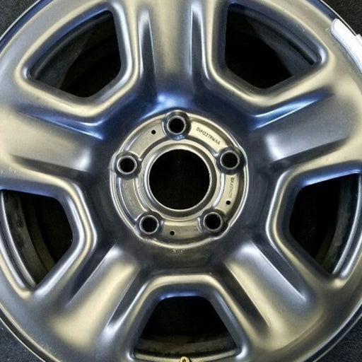 17" WRANGLER 18 VIN X , 17x7.5, , steel Original OEM Wheel Rim - Angle View