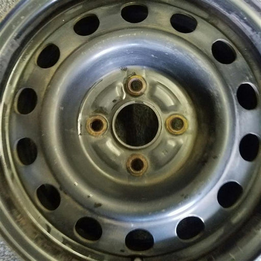 14" COROLLA 93-95 14x5.5, steel Original OEM Wheel Rim - Angle View