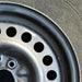 15" ALERO 99-04 15x6, steel Original OEM Wheel Rim - Close-Up Detail