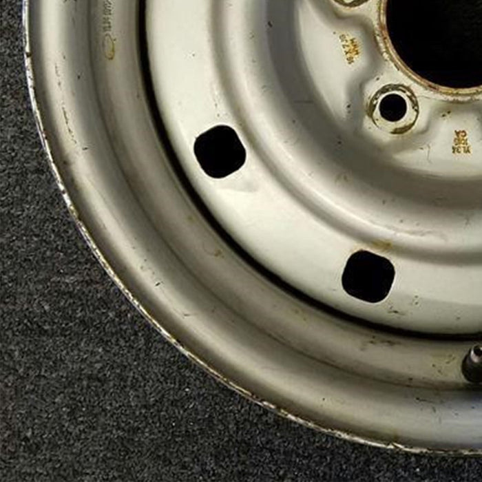 16" EXPEDITION 00 12mm lugs , 16x7, steel, 9 small holes Original OEM Wheel Rim - Back View