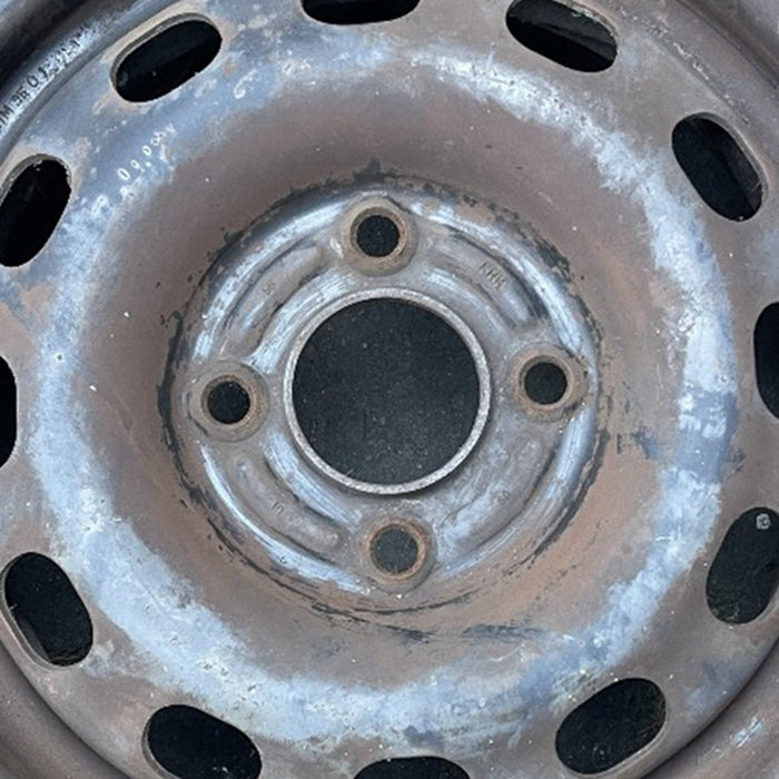 14" CONTOUR 95-97 14x5.5, steel Original OEM Wheel Rim - Angle View
