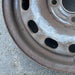 14" CONTOUR 95-97 14x5.5, steel Original OEM Wheel Rim - Back View