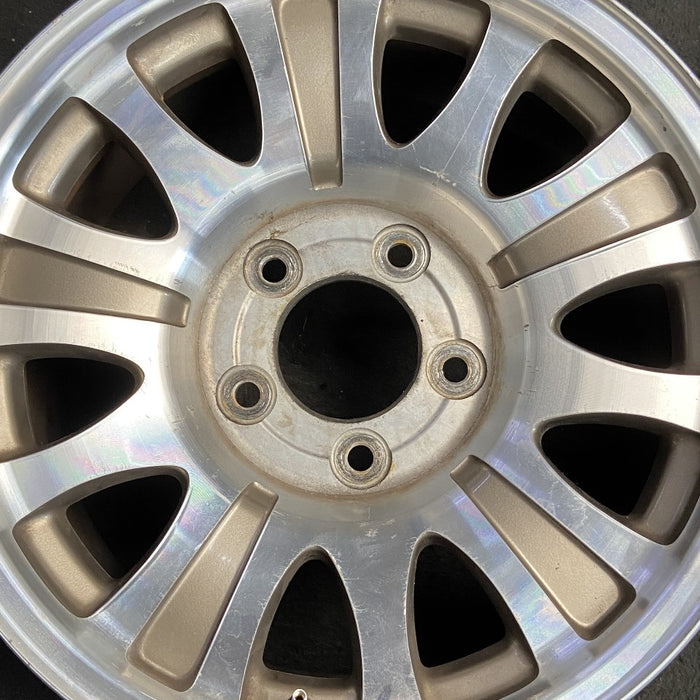 17" EXPEDITION 00 12mm lugs 14mm holes 17x7.5 aluminum 10 triangular holes gold pockets Original OEM Wheel Rim
