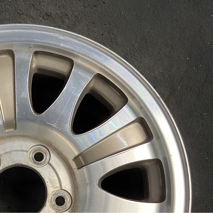 17" EXPEDITION 00 12mm lugs 14mm holes 17x7.5 aluminum 10 triangular holes gold pockets Original OEM Wheel Rim