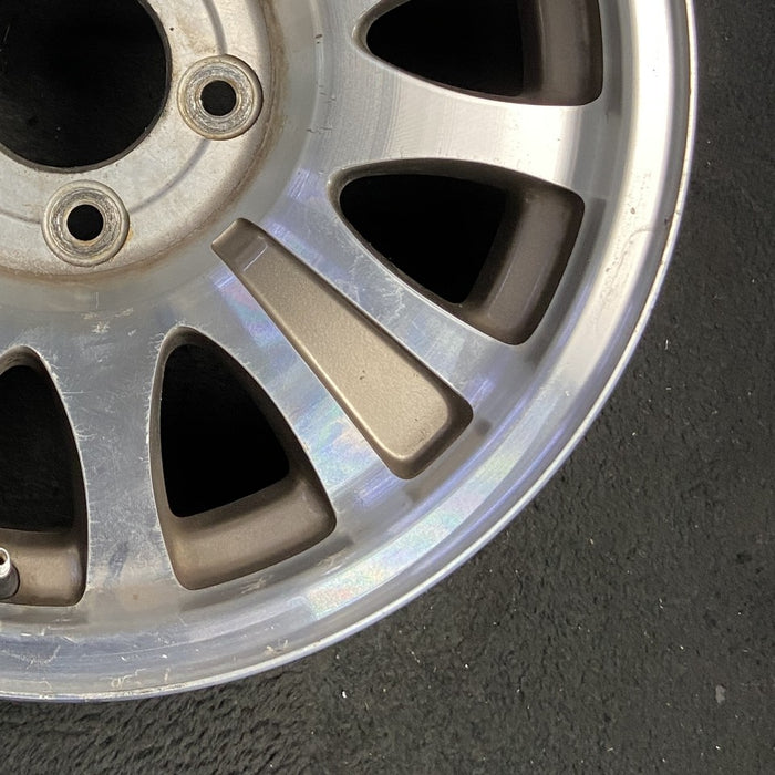 17" EXPEDITION 00 12mm lugs 14mm holes 17x7.5 aluminum 10 triangular holes gold pockets Original OEM Wheel Rim