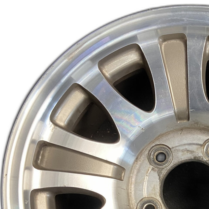 17" EXPEDITION 00 12mm lugs 14mm holes 17x7.5 aluminum 10 triangular holes gold pockets Original OEM Wheel Rim