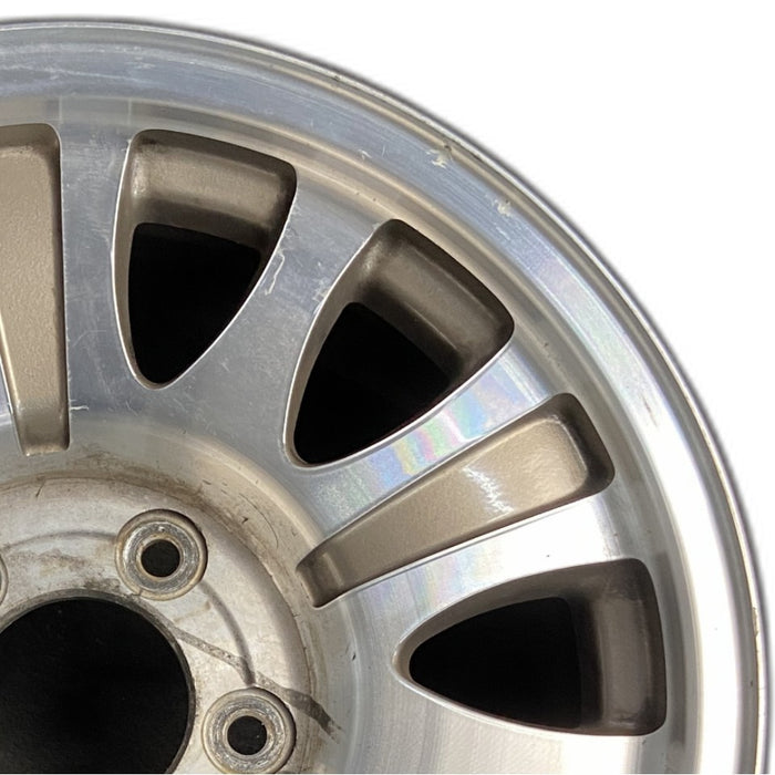 17" EXPEDITION 00 12mm lugs 14mm holes 17x7.5 aluminum 10 triangular holes gold pockets Original OEM Wheel Rim