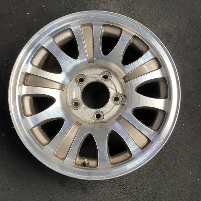 17" EXPEDITION 00 12mm lugs 14mm holes 17x7.5 aluminum 10 triangular holes gold pockets Original OEM Wheel Rim