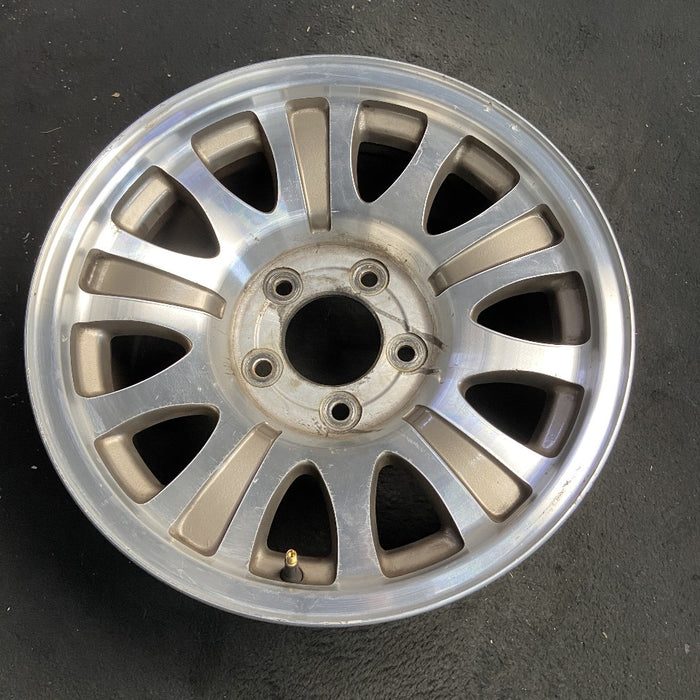 17" EXPEDITION 00 12mm lugs 14mm holes 17x7.5 aluminum 10 triangular holes gold pockets Original OEM Wheel Rim