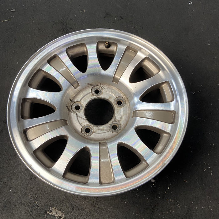 17" EXPEDITION 00 12mm lugs 14mm holes 17x7.5 aluminum 10 triangular holes gold pockets Original OEM Wheel Rim