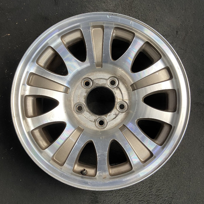 17" EXPEDITION 00 12mm lugs 14mm holes 17x7.5 aluminum 10 triangular holes gold pockets Original OEM Wheel Rim