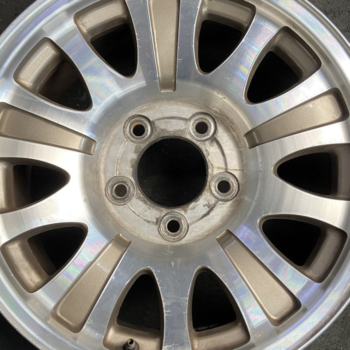 17" EXPEDITION 00 12mm lugs 14mm holes 17x7.5 aluminum 10 triangular holes gold pockets Original OEM Wheel Rim