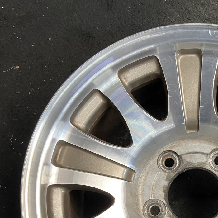 17" EXPEDITION 00 12mm lugs 14mm holes 17x7.5 aluminum 10 triangular holes gold pockets Original OEM Wheel Rim