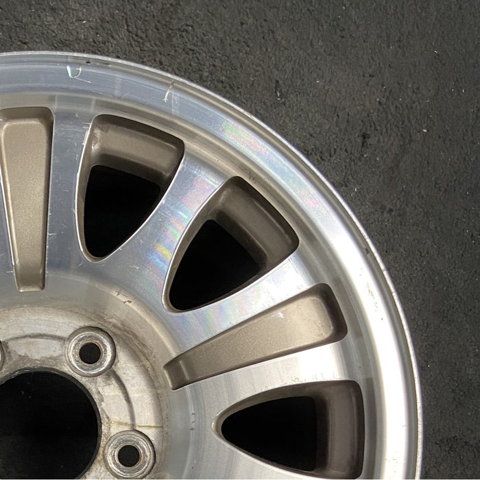 17" EXPEDITION 00 12mm lugs 14mm holes 17x7.5 aluminum 10 triangular holes gold pockets Original OEM Wheel Rim