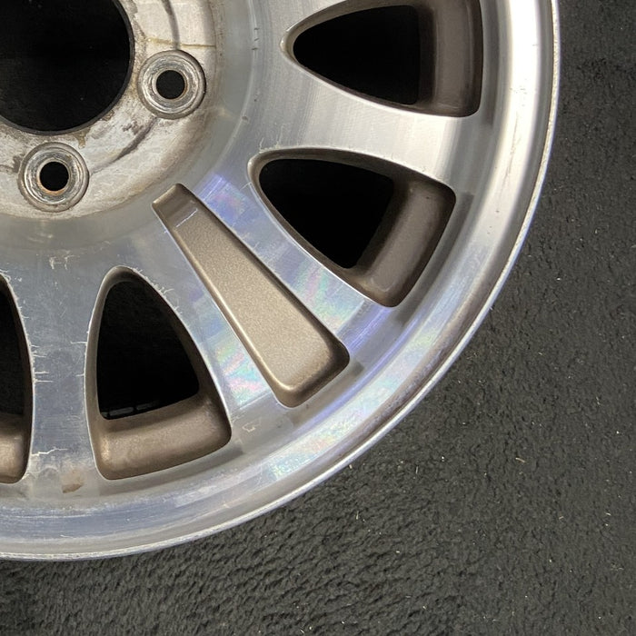 17" EXPEDITION 00 12mm lugs 14mm holes 17x7.5 aluminum 10 triangular holes gold pockets Original OEM Wheel Rim