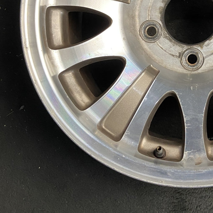 17" EXPEDITION 00 12mm lugs 14mm holes 17x7.5 aluminum 10 triangular holes gold pockets Original OEM Wheel Rim